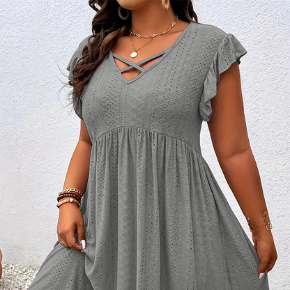 Női V-nyakú fodros szegélyű ruha